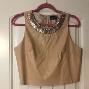 Faux leather crop top with embellishment